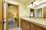 The Jack and Jill  bathroom has a shower and is shared by the twin bedroom and the queen bedroom.